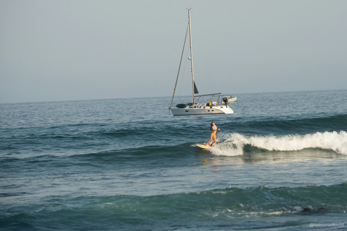 surf charter with a girl surfing in costa rica surf trip