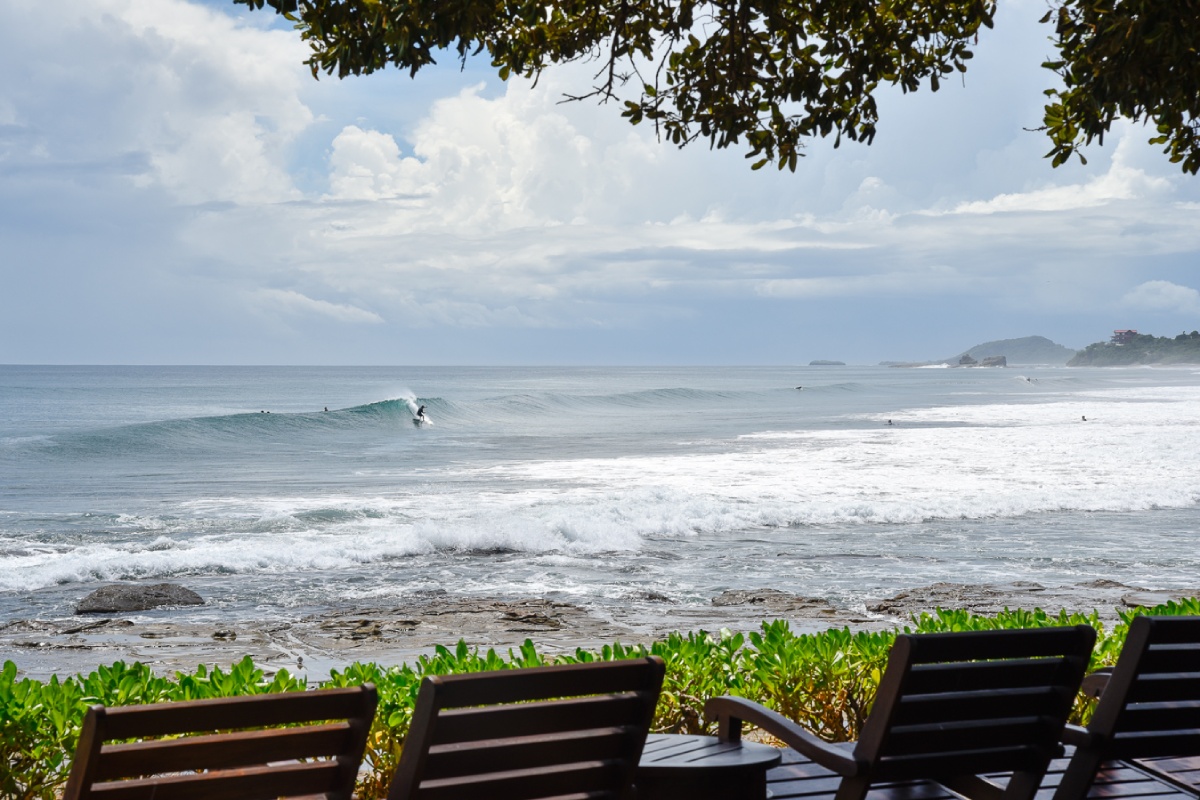surfer riding a wave in Nicaragua beach