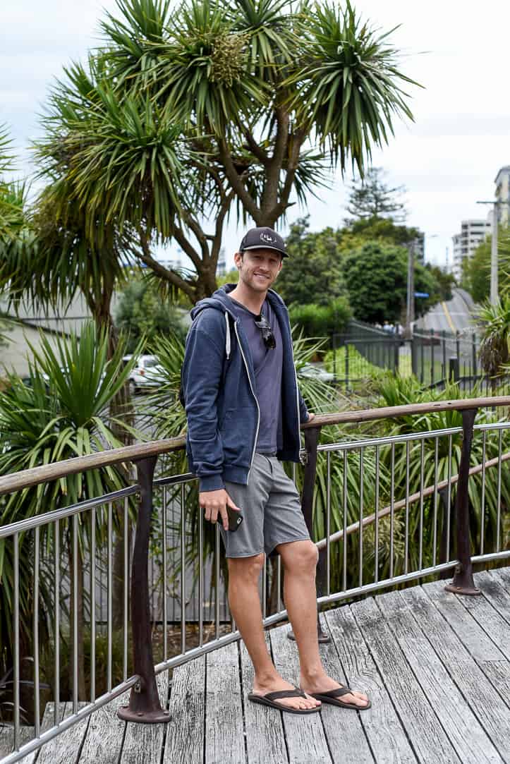 eric leaning against rail