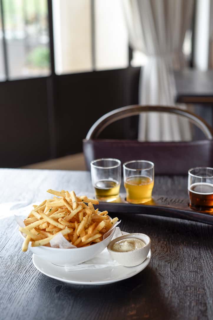 waiheke island french fries with flight of beer