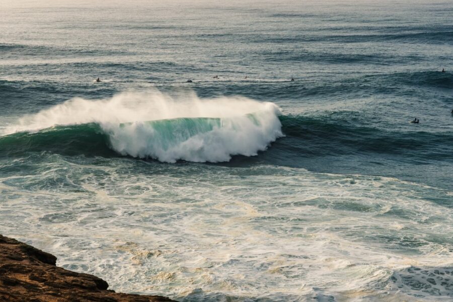 giant breaking wave in nazaré portugal