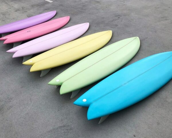 tri fin fish surfboard