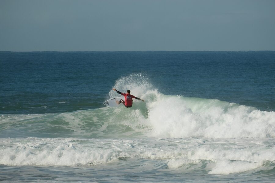 surfer wearing quiksilver wetsuit
