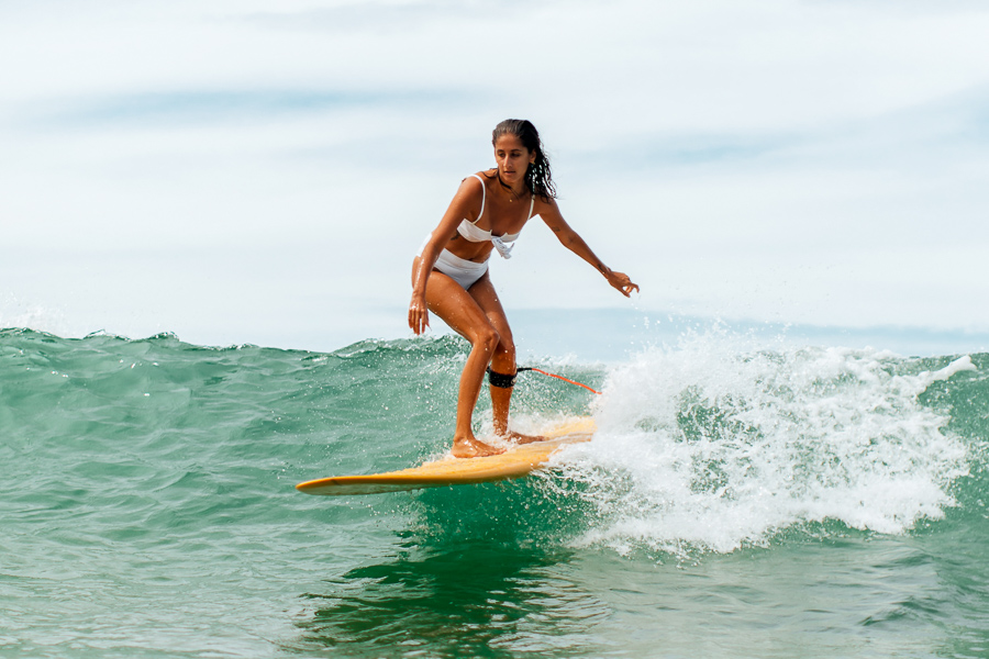 beginner surfer learning how to surf