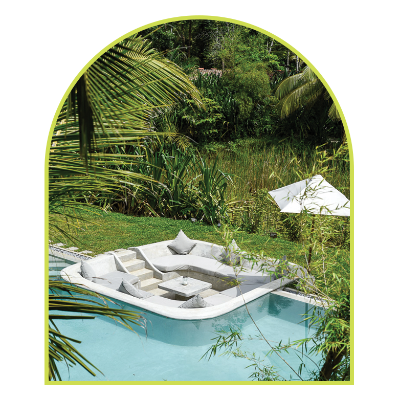 tropical lush poolside lounge area