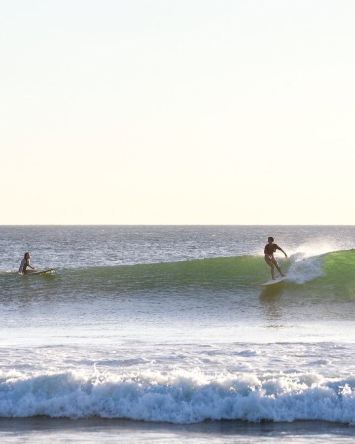 costa-rica-surf-trip costa rica surf trip surfer girl on right breaking wave