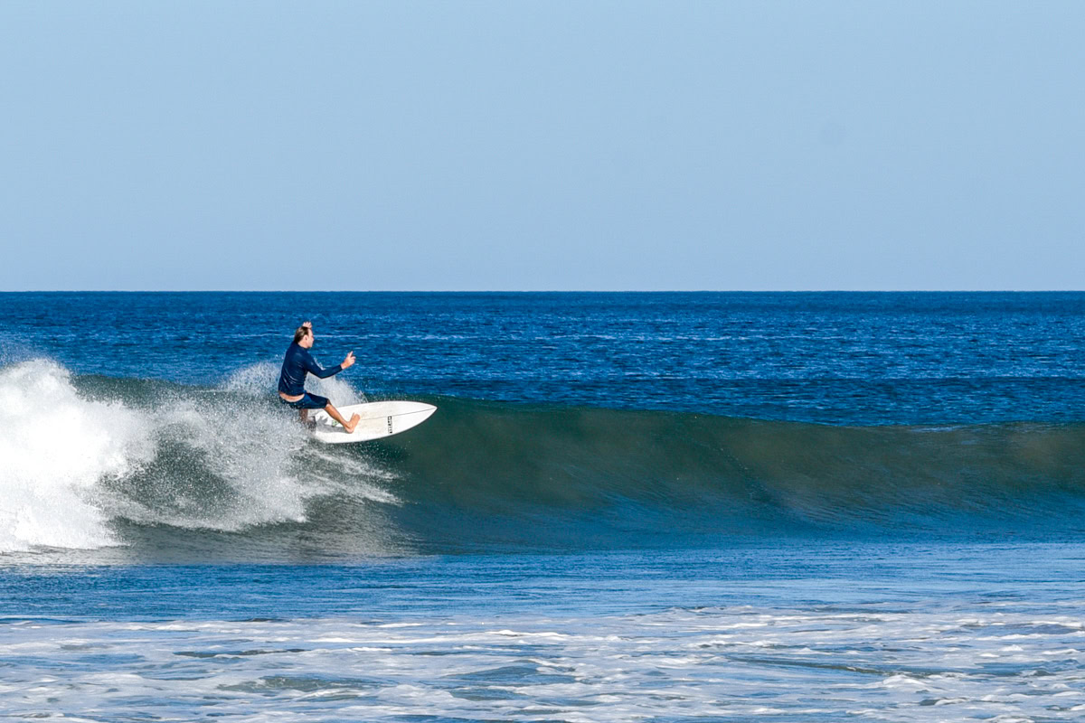 costa-rica-surf-trip-wave costa rica surf trip surfer on left breaking wave