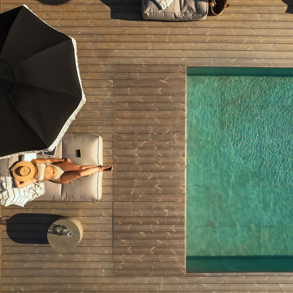 portugal-surfing-trip-girl-pool girl lounging by pool