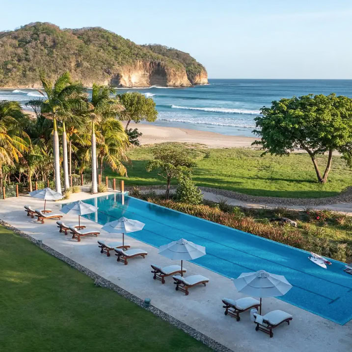 pool at luxury villa overlooking private beach