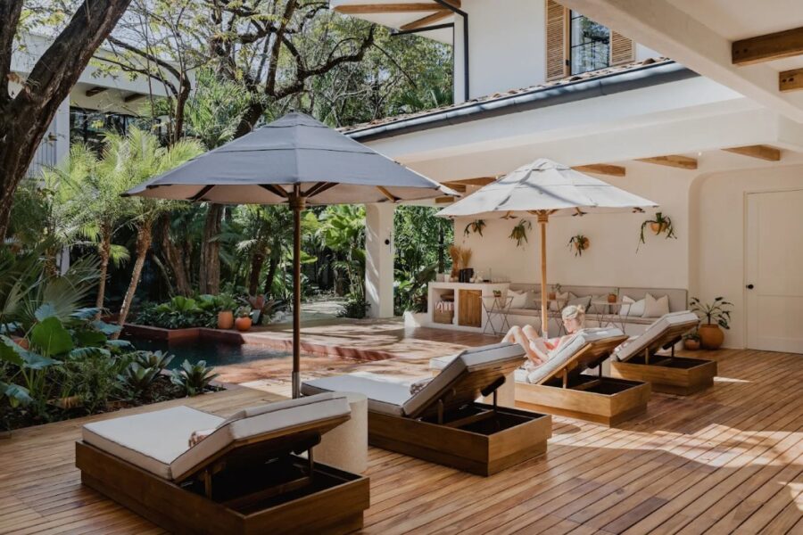 luxury boutique hotel pool loungers with tropical courtyard in nosara